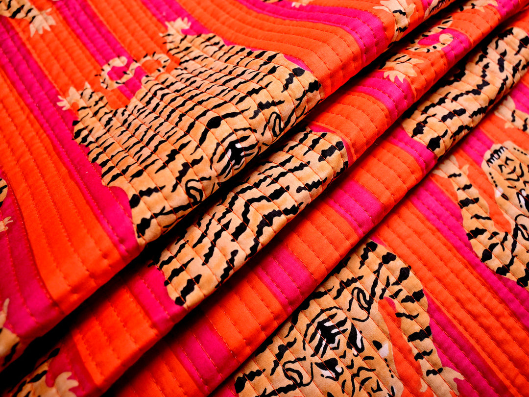 Luxury handcrafted quilt fabric with a Tibetan tiger print, perfect for travel bags and cushions.