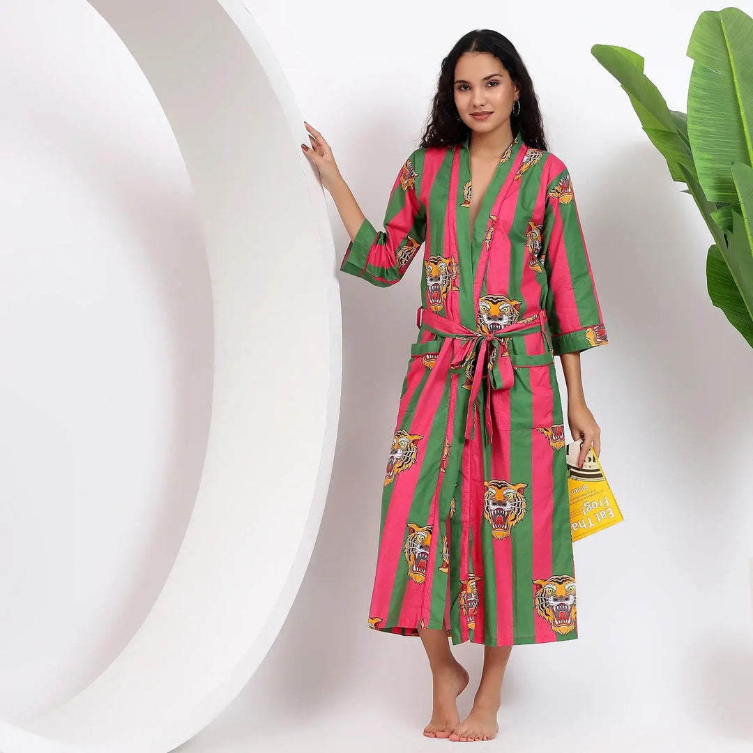 B2B wholesale fabrics collection featuring a model in a vibrant striped robe with tiger prints.