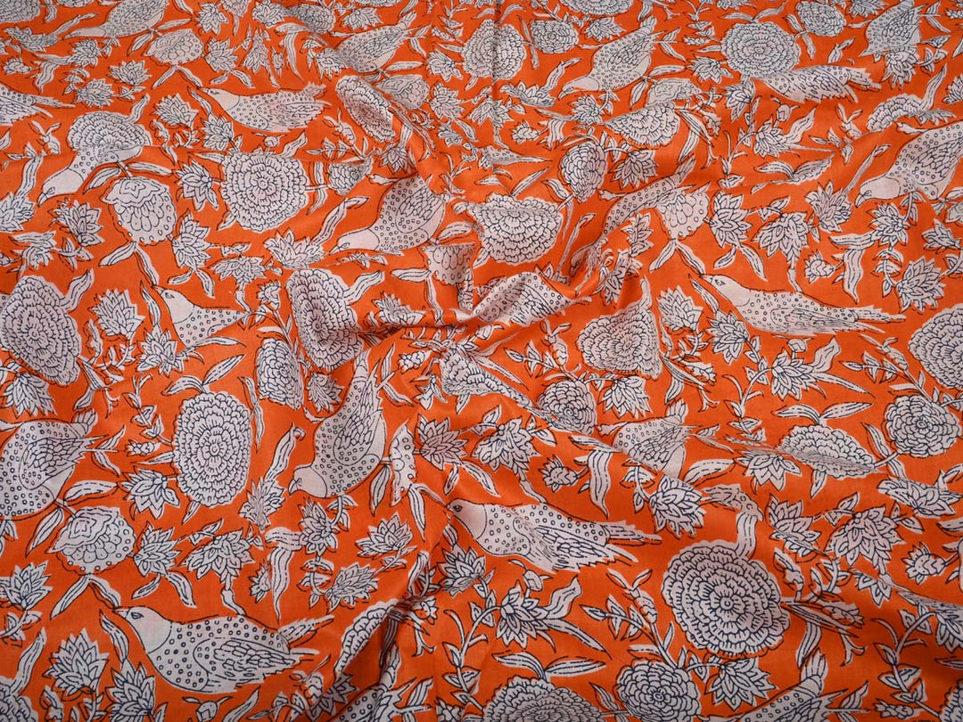 orange printed cotton dress material