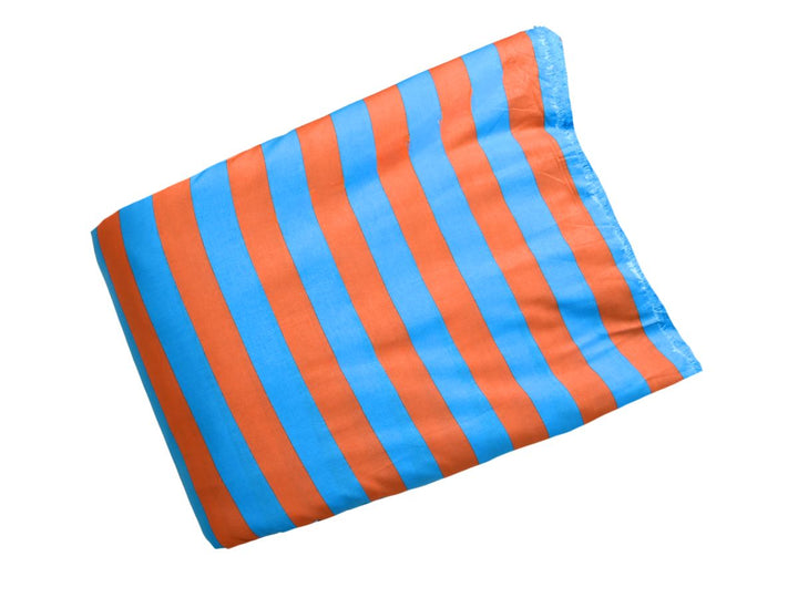 A folded striped fabric item, likely a beach towel or blanket, featuring alternating bright blue and orange vertical stripes on a plain white background.