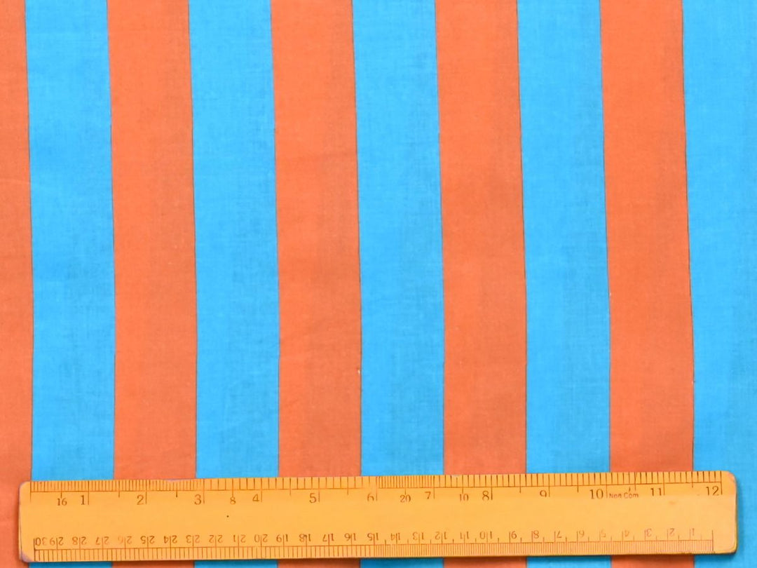 A bolt of 44 inch wide turquoise and orange vertical stripe fabric sold by the yard.