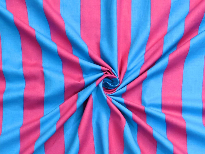 Blue and pink striped fabric folded showing even symmetrical stripe pattern