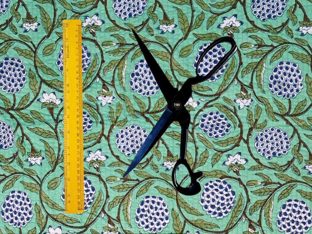 Blue and white floral printed quilted cotton fabric for sewing and quilting projects