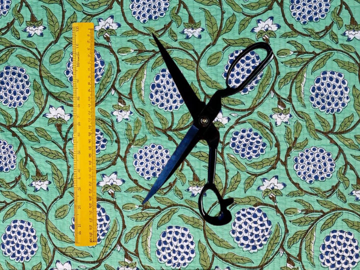 Blue and white floral printed quilted cotton fabric for sewing and quilting projects