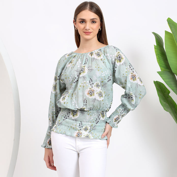 Green floral smocked waist top with long sleeves, perfect for casual or office wear