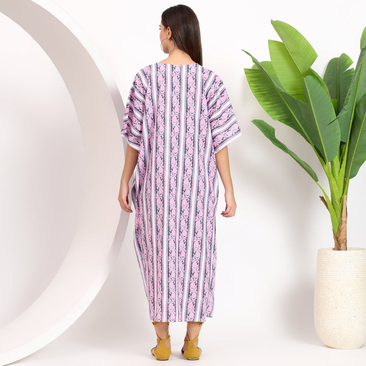 Back view of a comfortable plus-size kaftan dress in striped print, designed with a flowy silhouette for casual and chic looks.