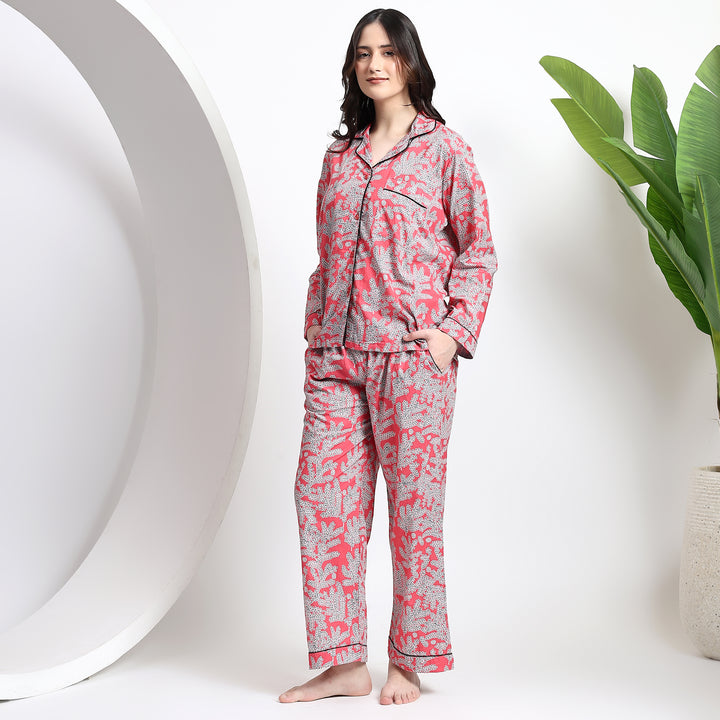 Women’s cotton pajama set in pink floral print, button-up top and full-length pants for comfortable sleepwear.