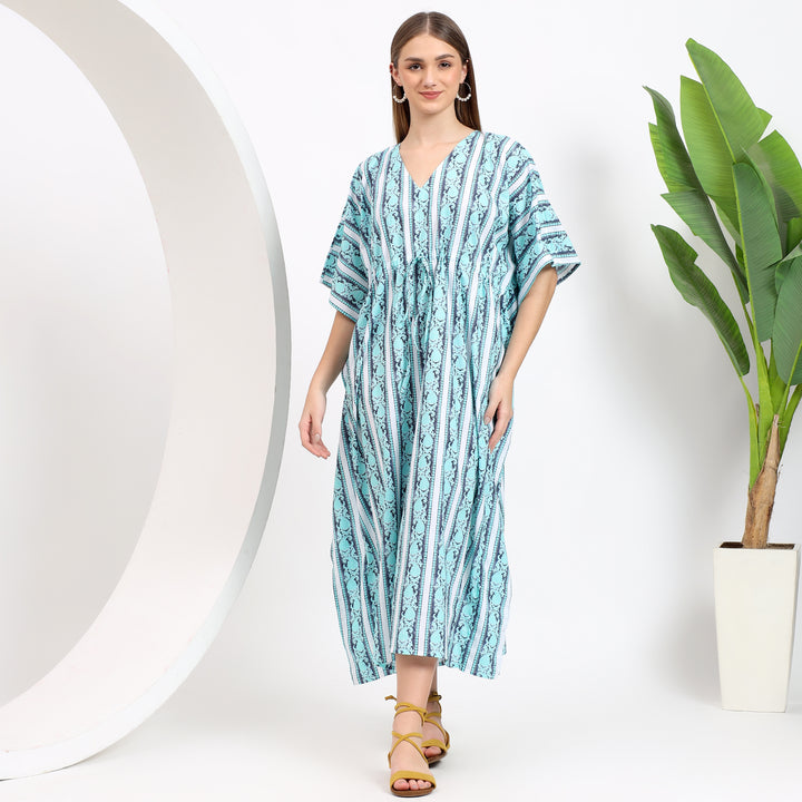 Dynamic shot of striped cotton kaftan dress flowing effortlessly, perfect for a stylish yet relaxed look