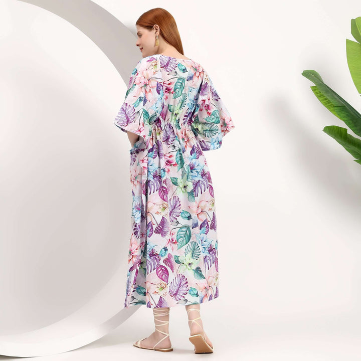 Wholesale summer caftan for small shops featuring a colorful floral design, perfect for warm weather styling.