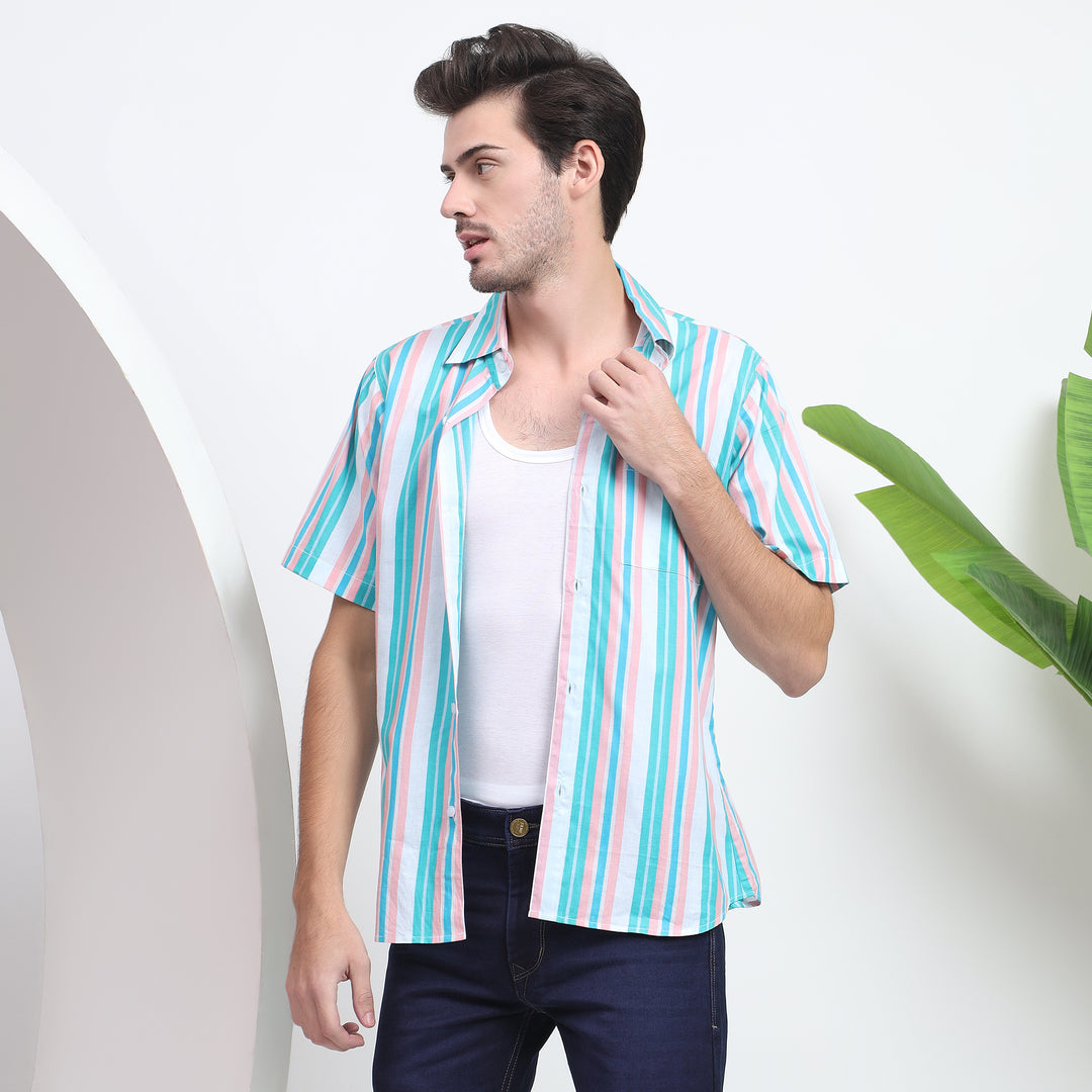 Button-down design on the men’s shirt with white and blue stripes, perfect for laid-back days.