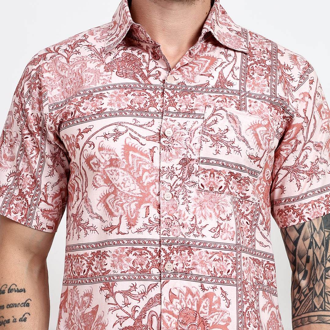 Close-up of button-down front on men’s printed cotton shirt.