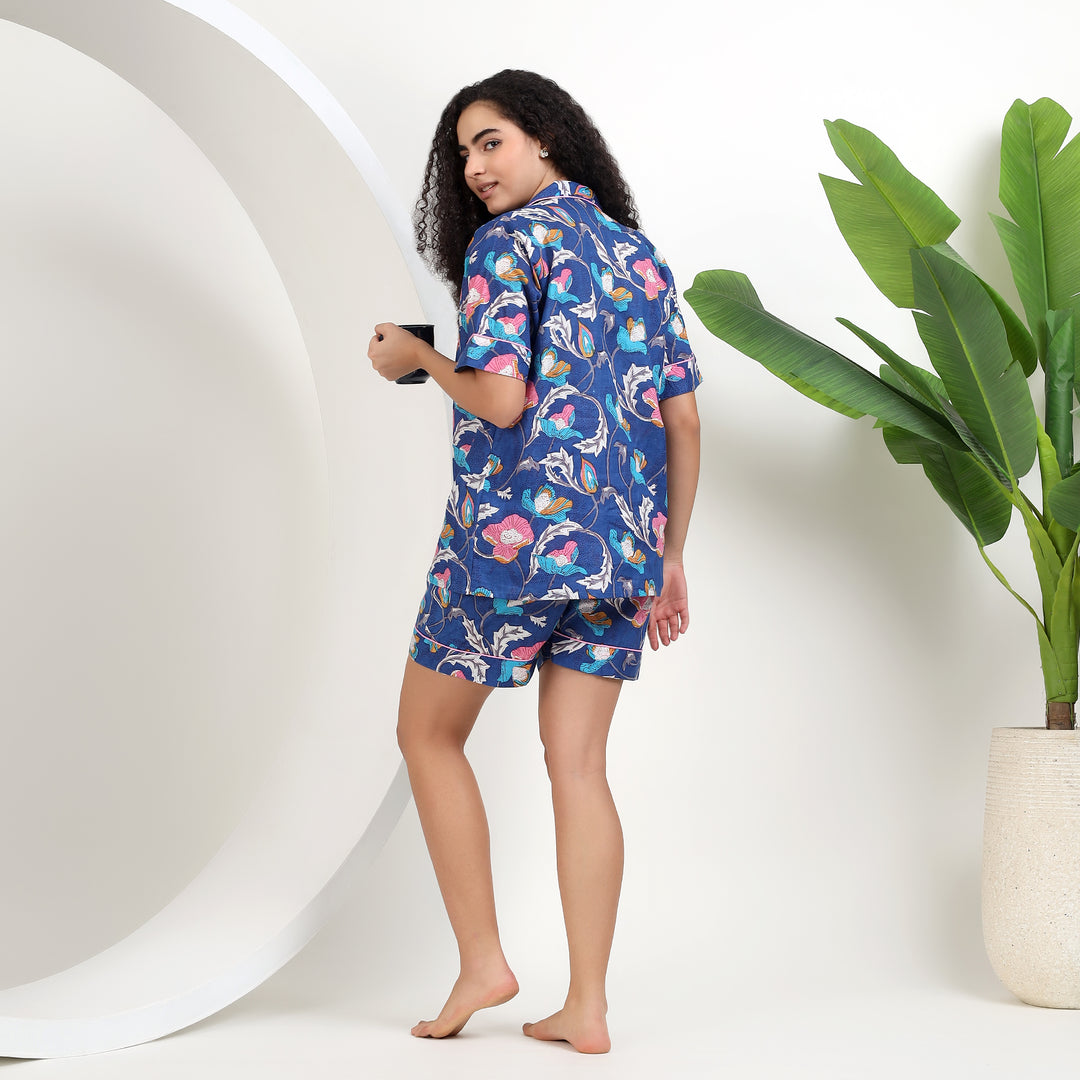 Side view of IndoLibas blue floral pajama shorts showing side pockets