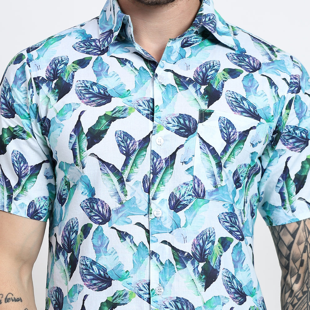 Close-up of a men's classic fit shirt with a bold leaves pattern