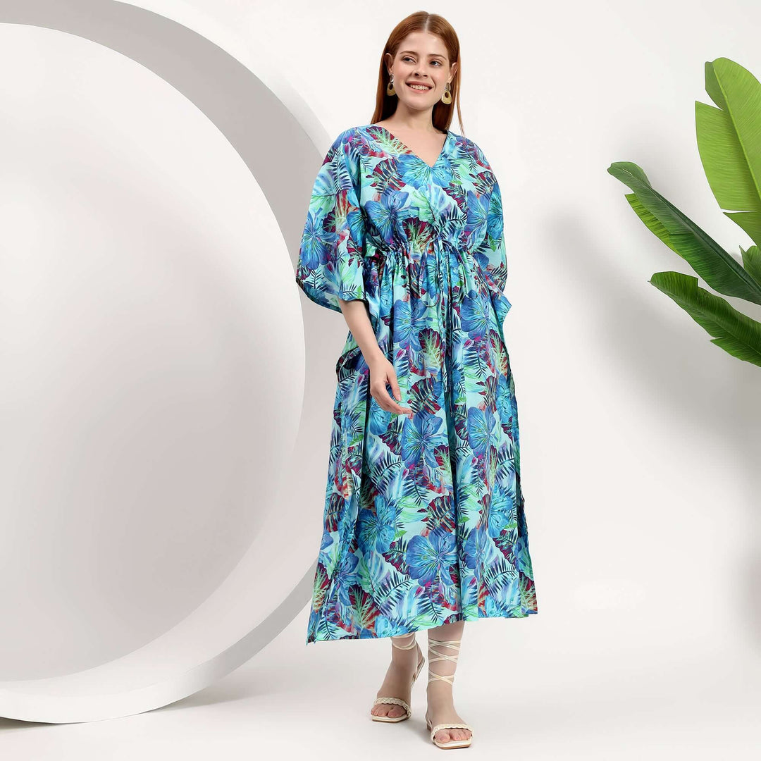 Plus size caftans wholesale in vibrant floral print, ideal beach cover-up and resort wear for stylish women.