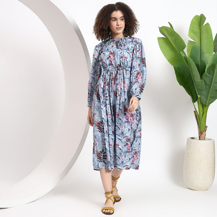 Floral print cotton dress with a shirt collar and long sleeves, ideal for casual occasions and gatherings.