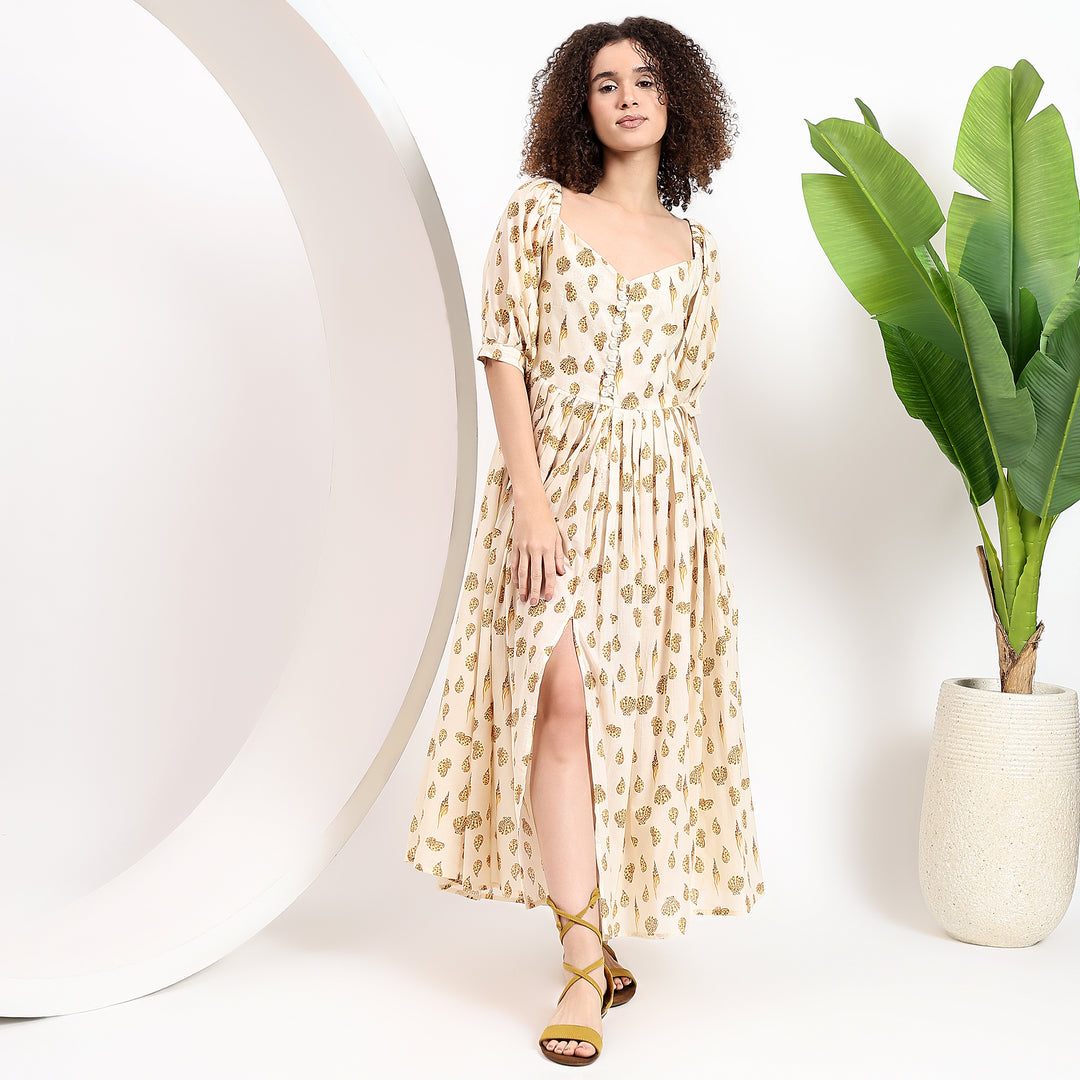 Jenner Yellow Maxi Dress with a breathable cotton fabric, making it a standout choice for warm weather and chic gatherings.