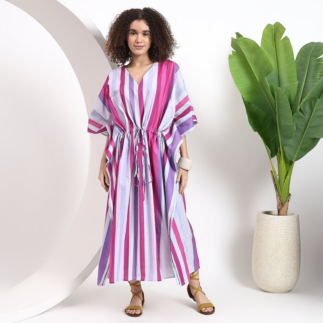 Full view of a pink striped kaftan maxi dress with a flowy silhouette