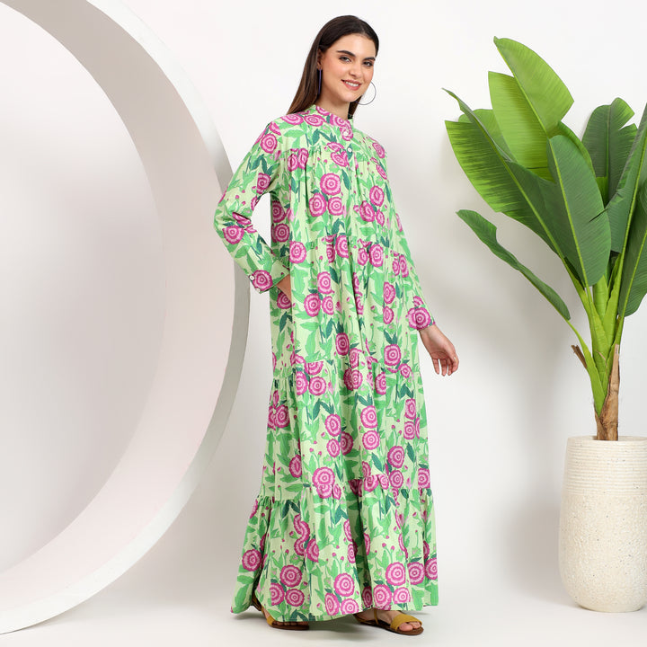 Full-length modest dress with timeless floral design and button detail.