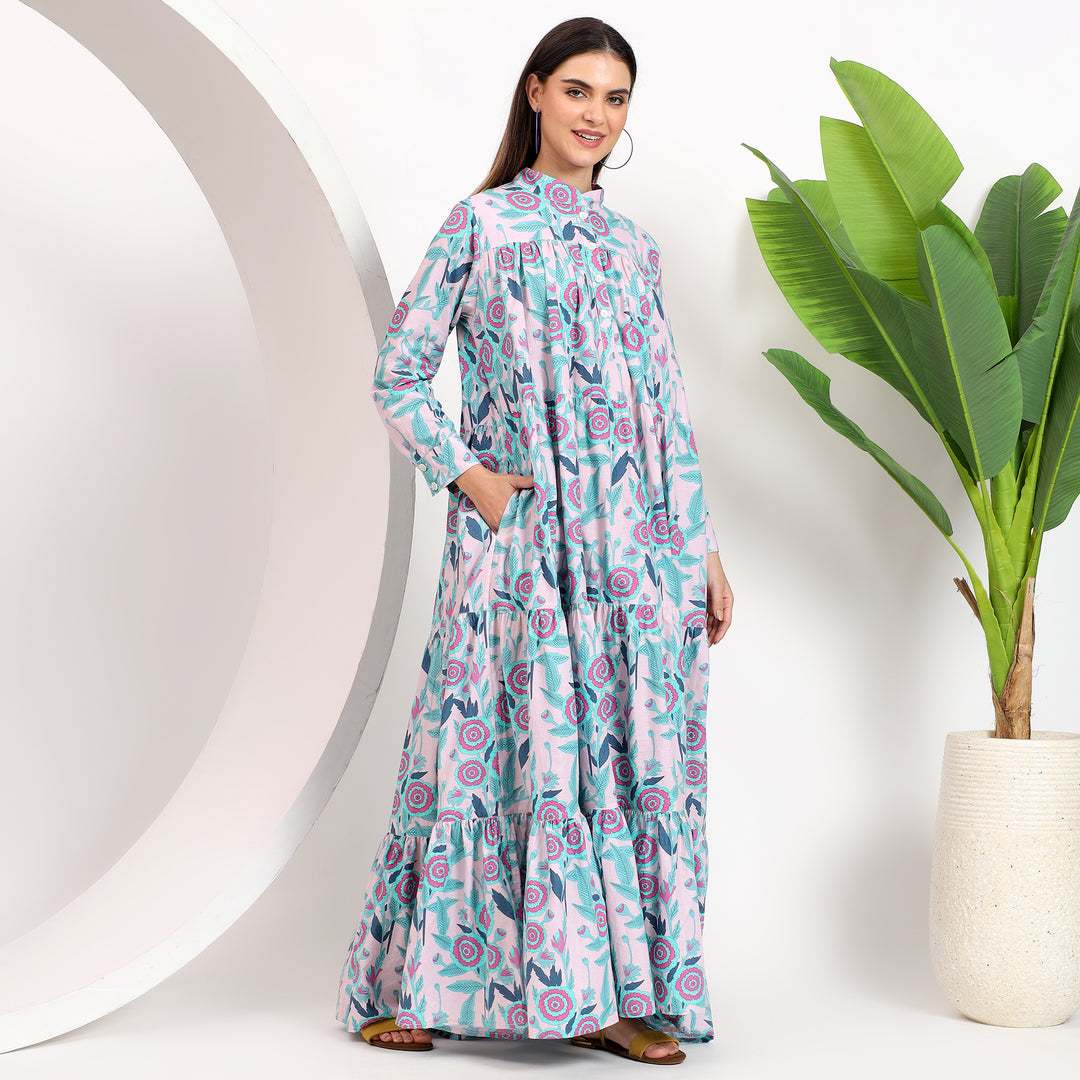 Floral cotton maxi dress featuring side pockets and elegant floor-length