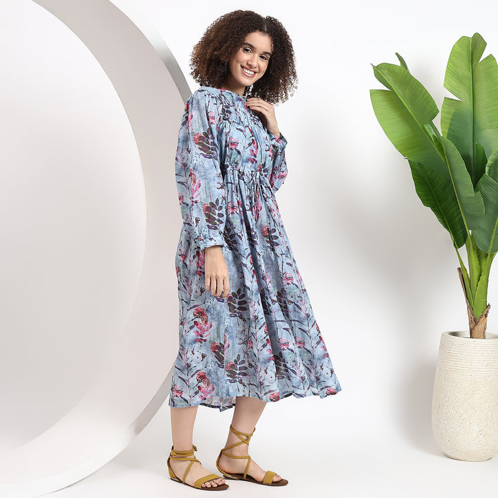 Feminine pastel A-line dress with a flattering floral print and long sleeves 