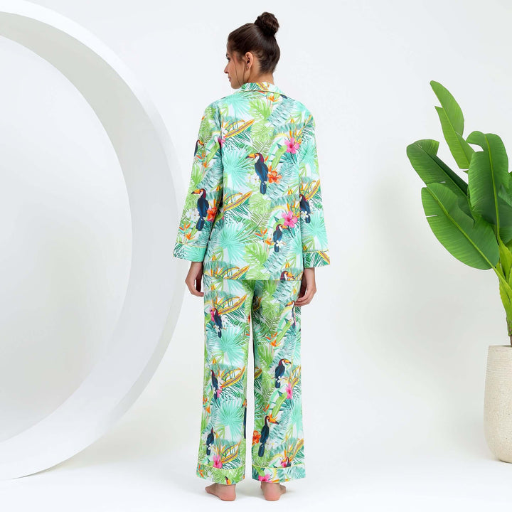 Tropical Print Indian Pajamas for Women displayed from the back in a bright tropical design with greenery.