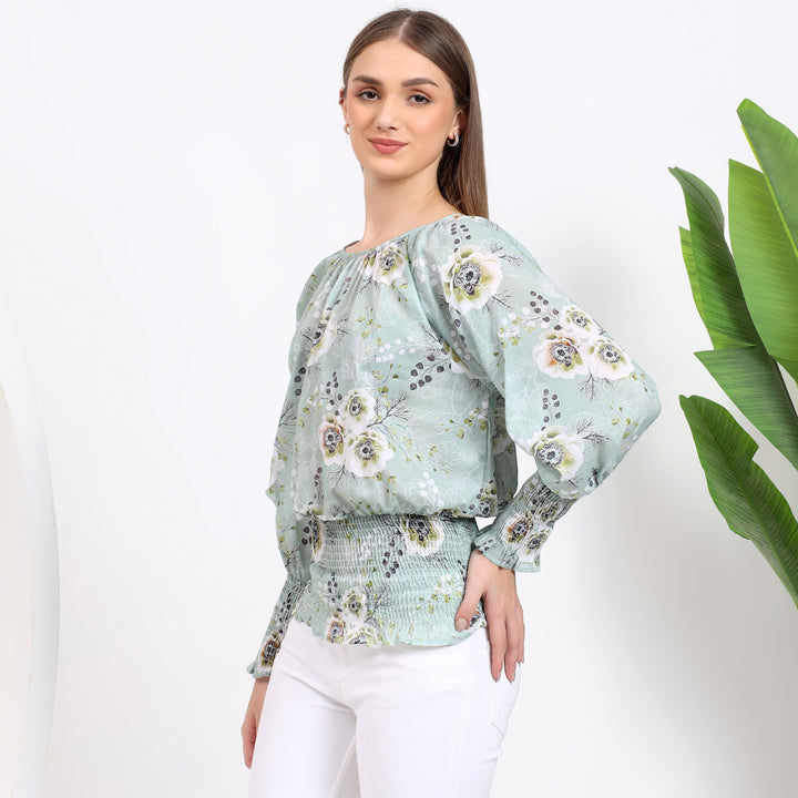 Full coverage with long sleeves and a comfortable smocked waist, featuring a feminine floral pattern