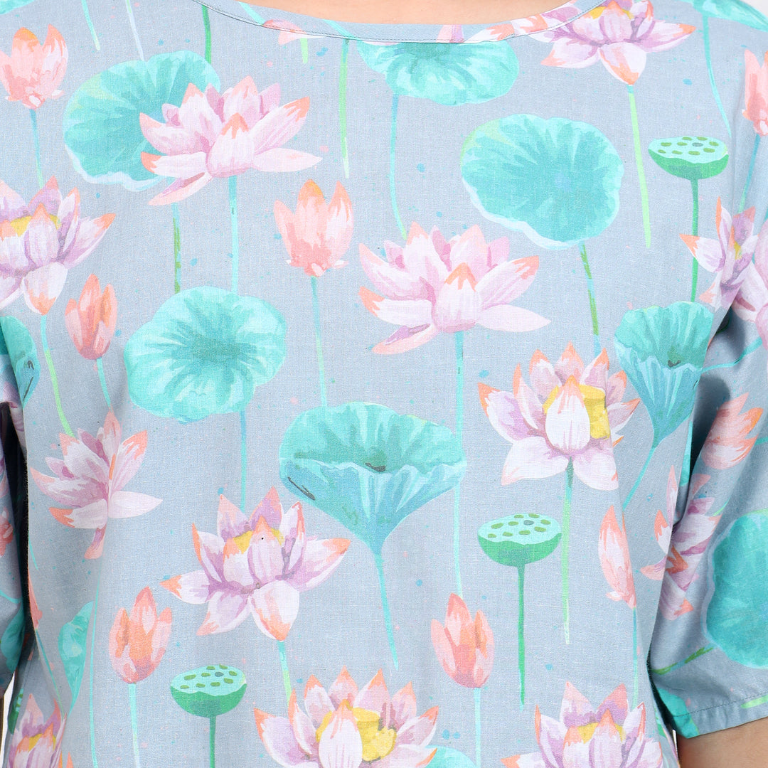 Chic light blue floral top, a versatile addition to any wardrobe for work or casual outings.