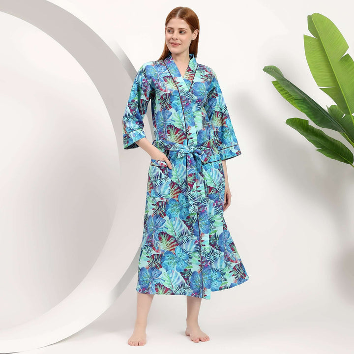 A model wearing a wholesale floral dressing gown, showcasing vibrant tropical patterns in a comfortable, stylish design.