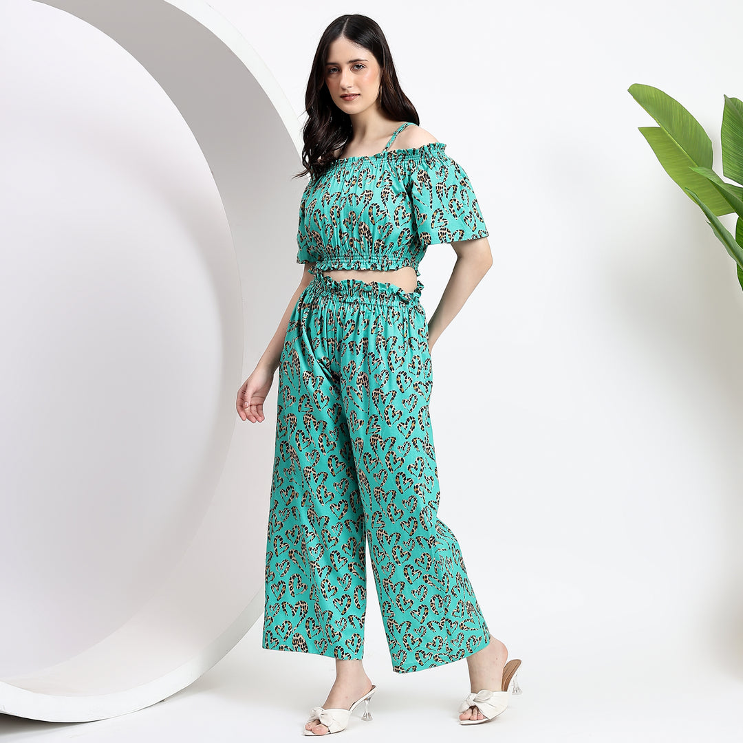 Off-shoulder top and wide-leg pants set styled for a trendy look