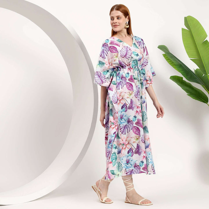 wholesale summer caftan for small shops worn by model with floral design in a bright setting