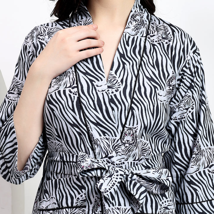 Adjustable waist tie detail of a gray tiger print robe for a customizable and secure fit