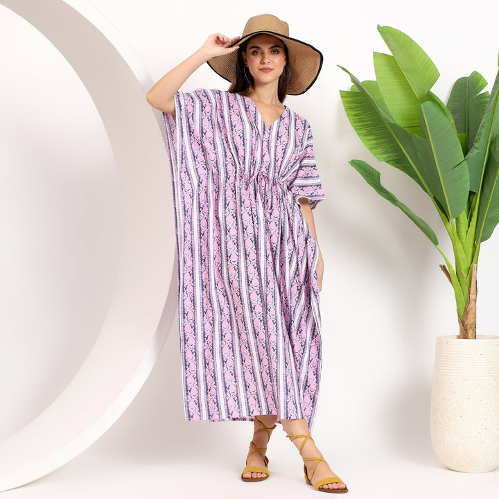 Plus-size women's striped kaftan dress styled for casual and festive occasions