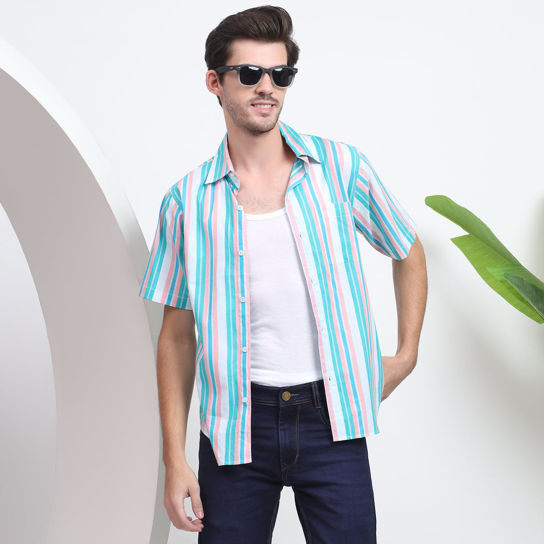 Pair this striped shirt with chinos for a smart-casual ensemble – featuring alternating blue and white bands