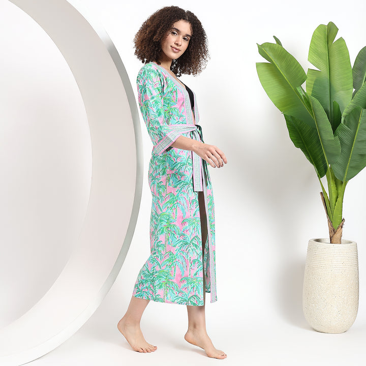 Relaxed fit belted kimono featuring a trendy palm print design