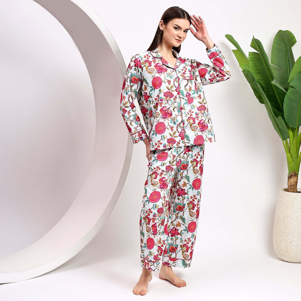 Model wearing floral print cotton pajamas for women, showcasing comfort and style with vibrant floral design.