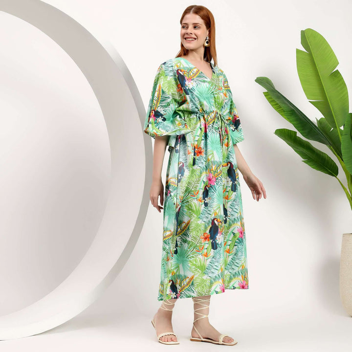 wholesale cotton kaftans for boutiques in a vibrant tropical print, perfect for summer and resort wear.