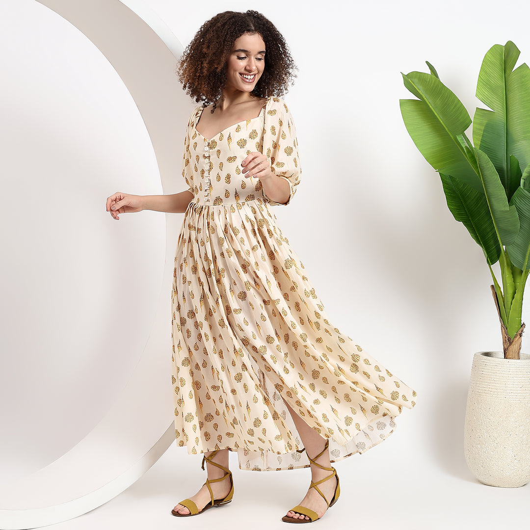 Comfortable and lightweight yellow cotton dress with puff sleeves and a wide, flowy skirt for ease of movement.