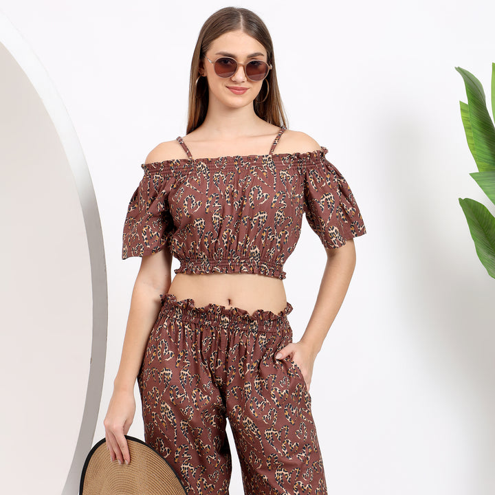 Off-shoulder crop top and flowy wide-leg pants set for a chic casual look