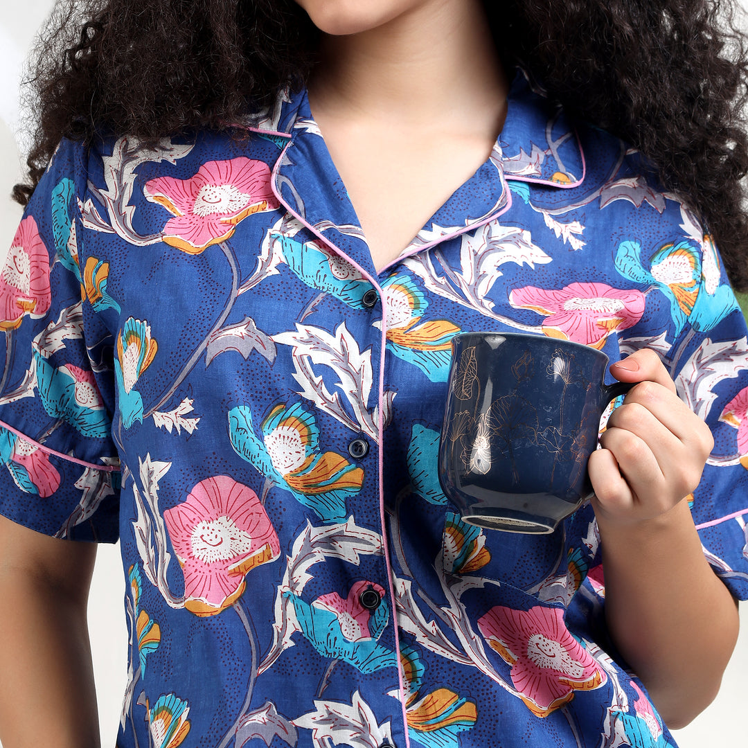 Folded IndoLibas blue floral women's cotton sleepwear set displaying stitching
