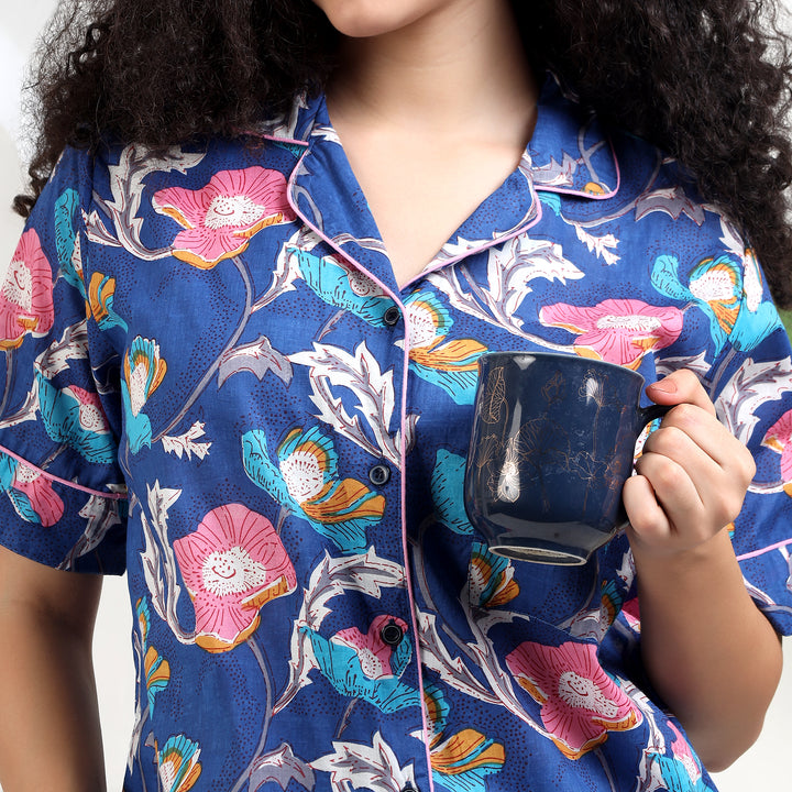 Folded IndoLibas blue floral women's cotton sleepwear set displaying stitching