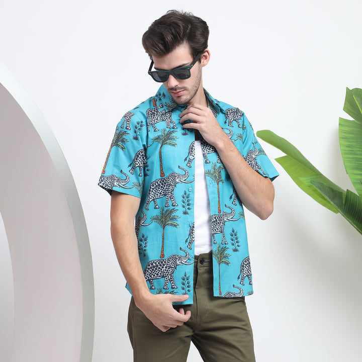 Blue cotton animal print shirt featuring elephants, ideal for beach outings