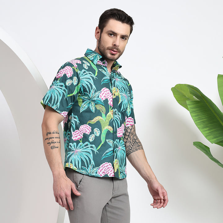 Side view of men's tropical print dark green shirt, perfect for casual occasions