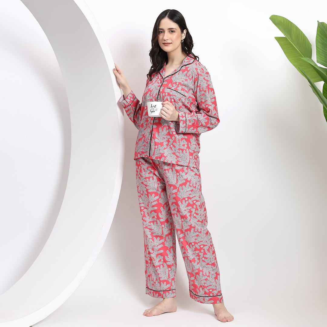 Matching Christmas pajama set for women, featuring soft cotton fabric and floral print design, perfect for the holiday season.