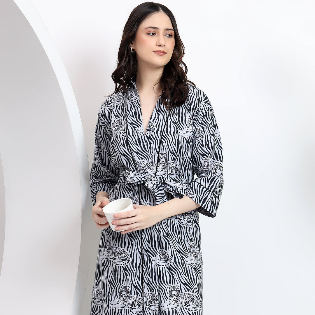 Relaxed pose showcasing the comfort and flow of the gray abstract tiger print cotton kimono robe