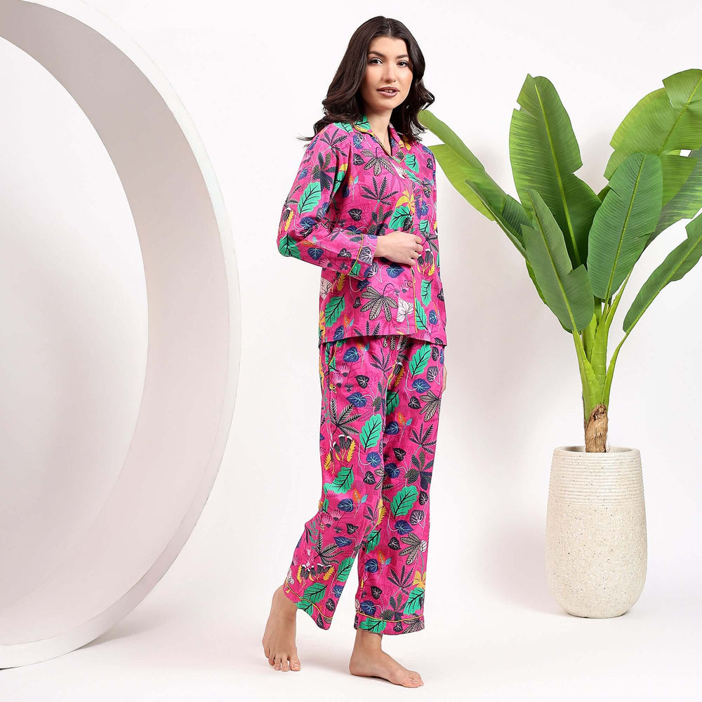 Elegant woman modeling a comfortable women's tropical floral pajama set, perfect for lounging and sleep.