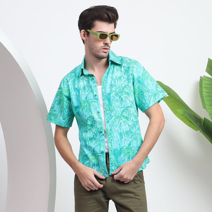 Vibrant blue beach shirt for men, offering comfort and tropical style