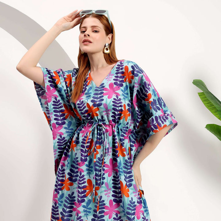 wholesale Moroccan kaftan dress in vibrant floral print, Model showcasing a perfect for retail shops.