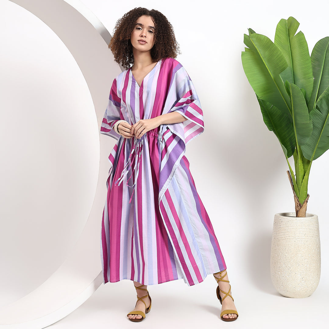 Pink striped kaftan maxi dress with flowy design for women.