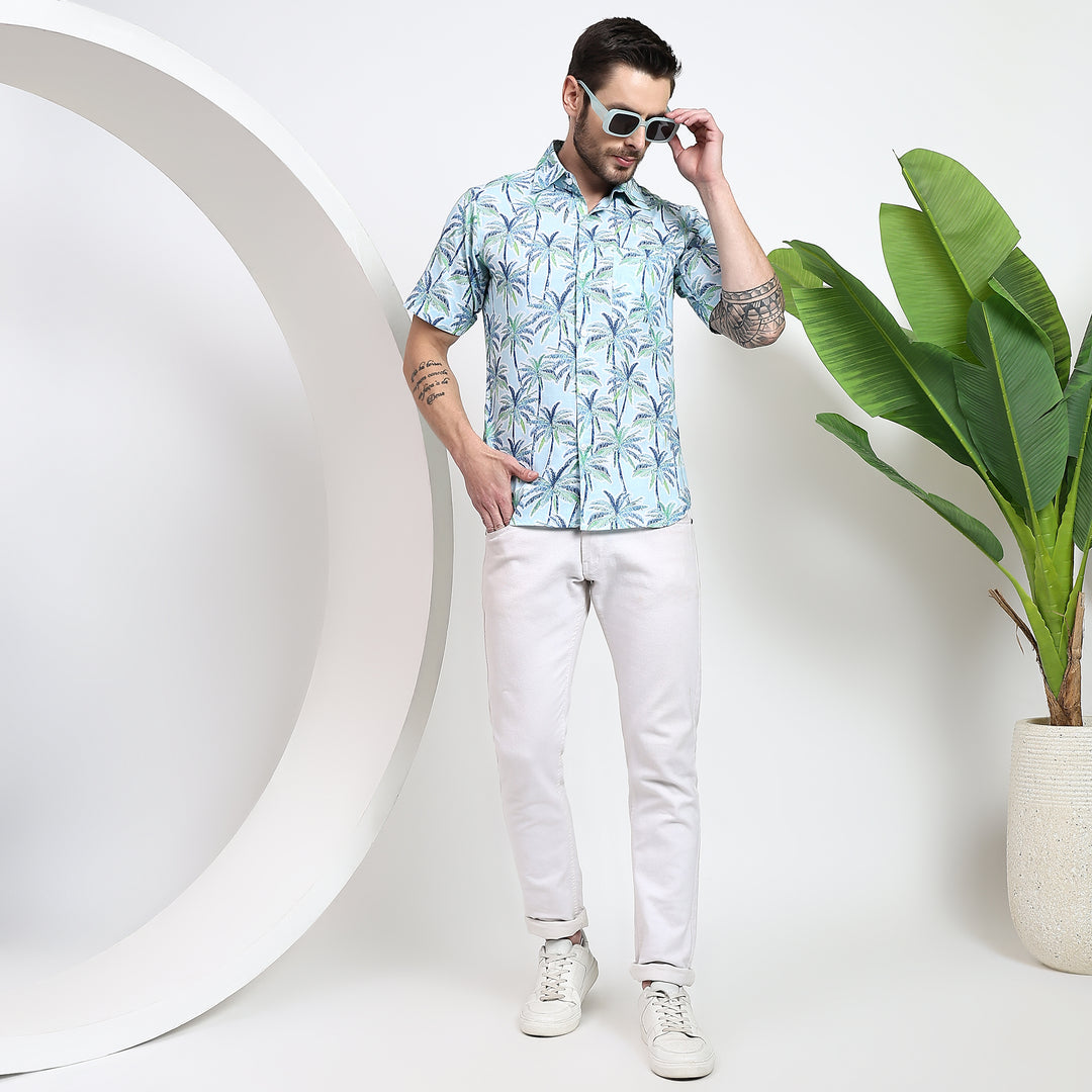 Pair this printed shirt with denim jeans or casual shorts for a relaxed yet stylish look