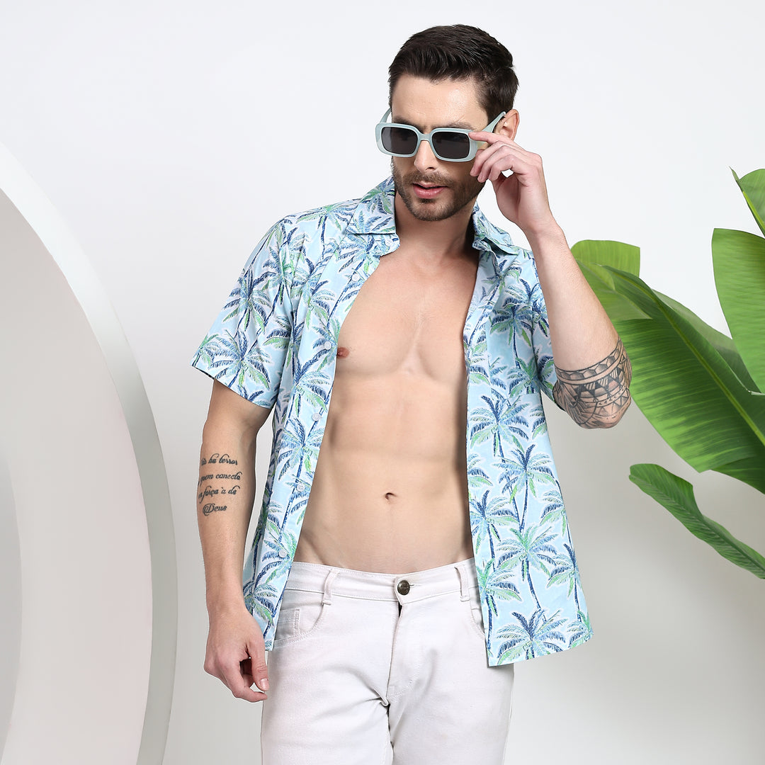 Front view of men's cotton shirt with vibrant palm tree print.